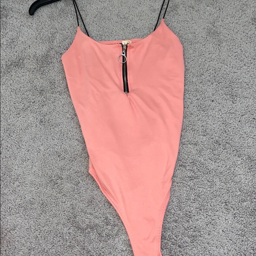 pink zip down bodysuit